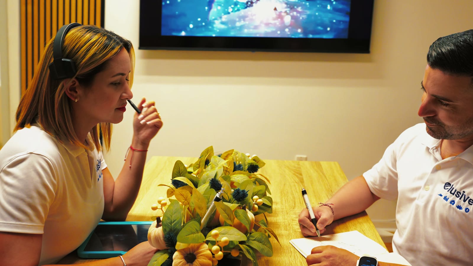 Elusive Remodel team members planning a project at the Miami office