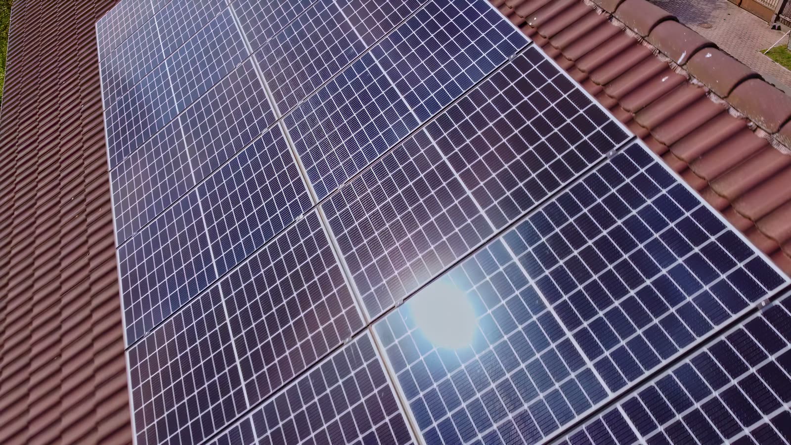 Solar installation: panels mounted on a tile roof