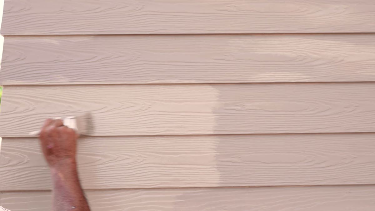 Coating wood siding