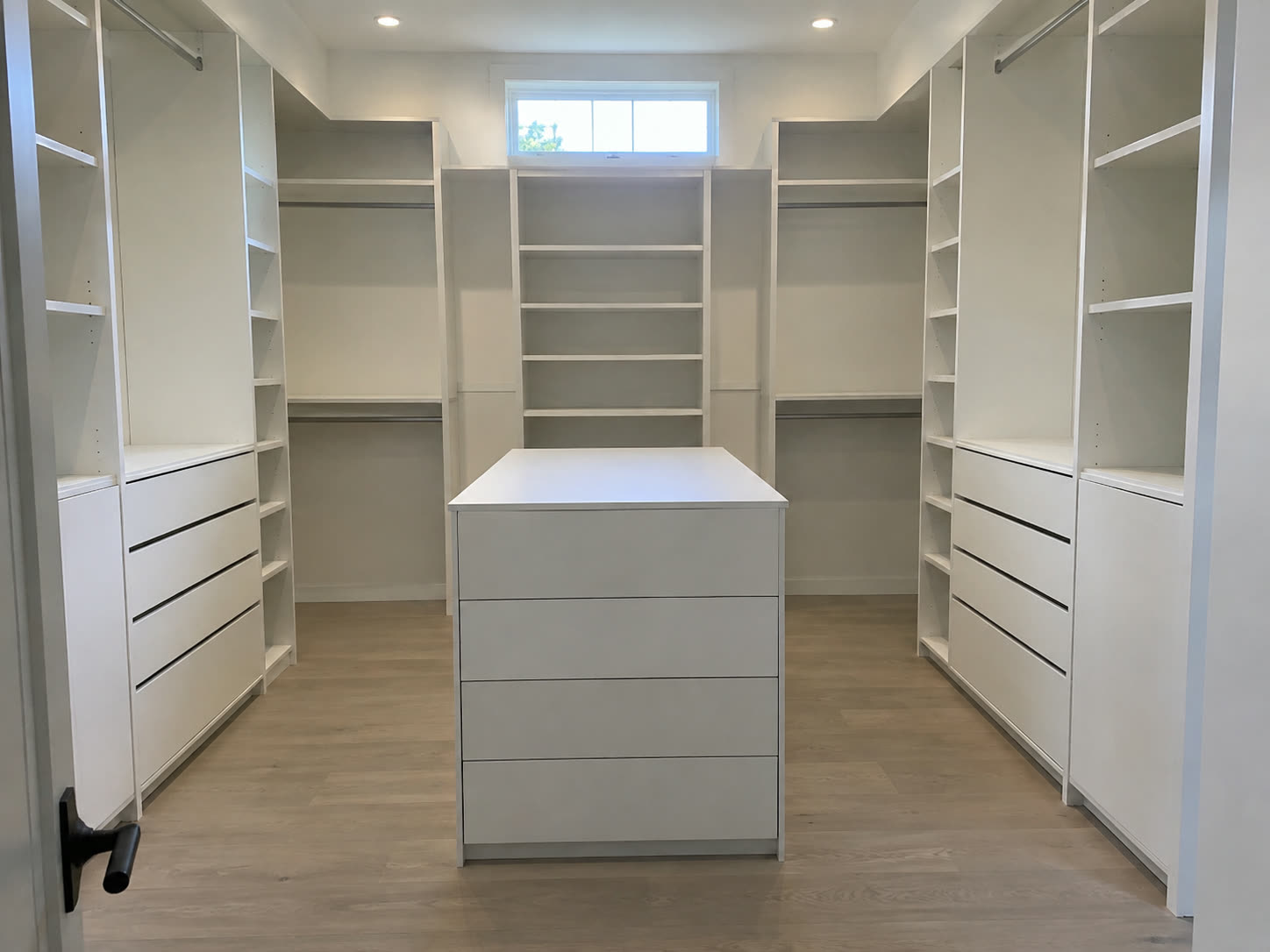 Walk-in closet with an island