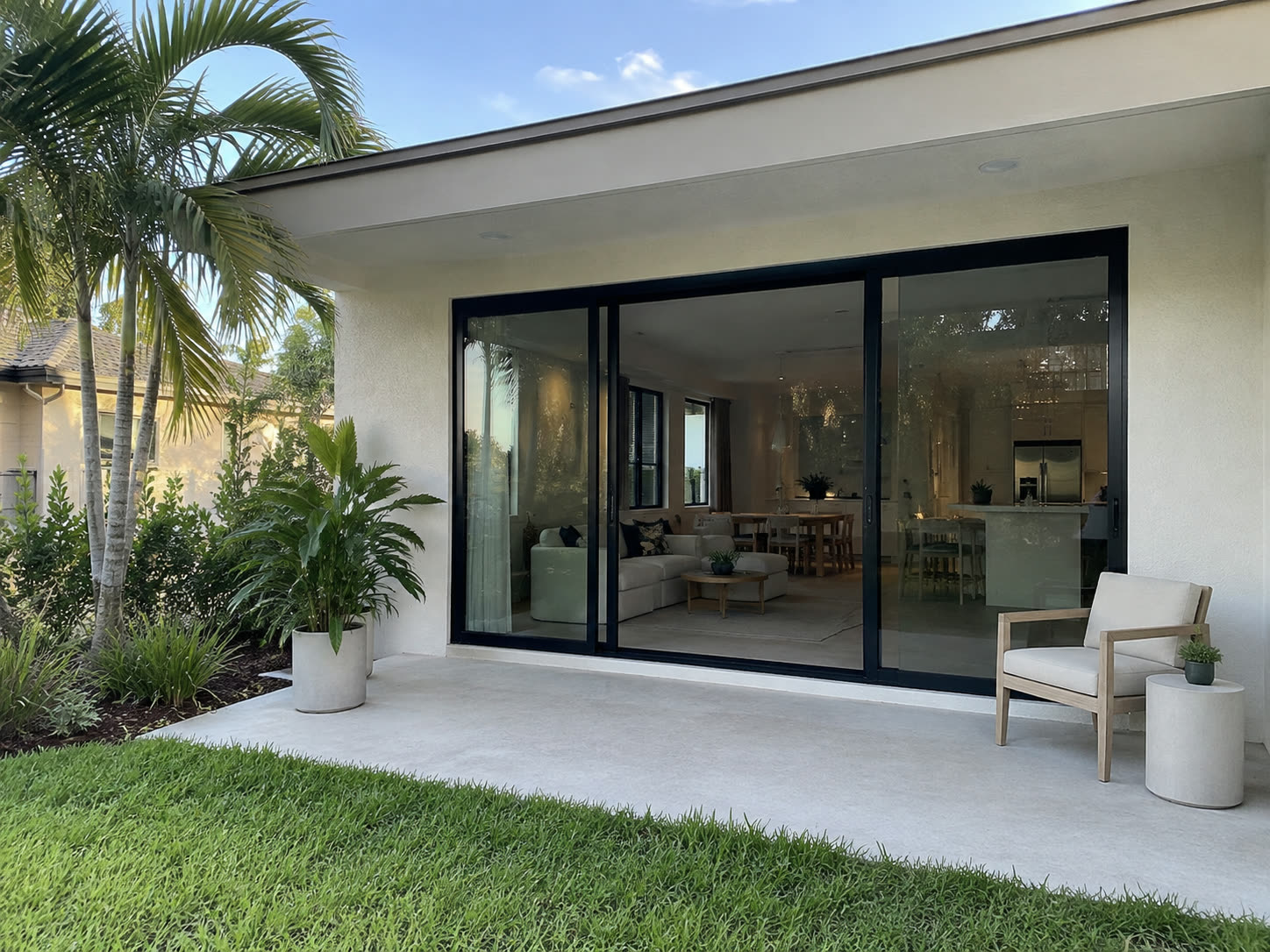 Sliding glass doors along a covered patio