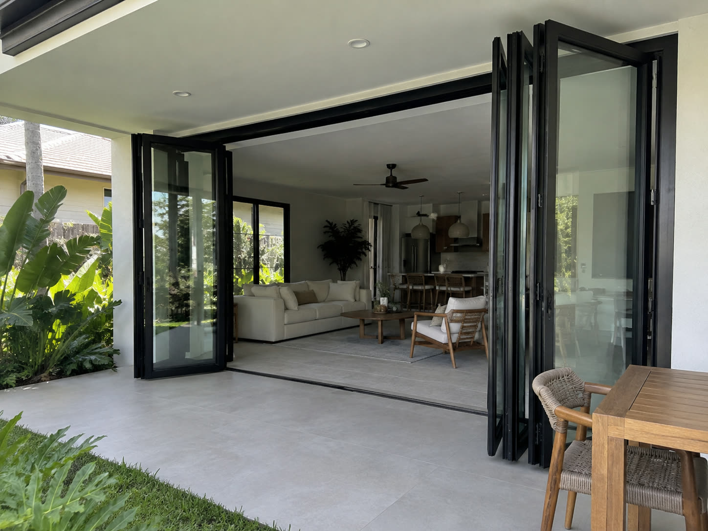 Folding glass doors opened to the patio