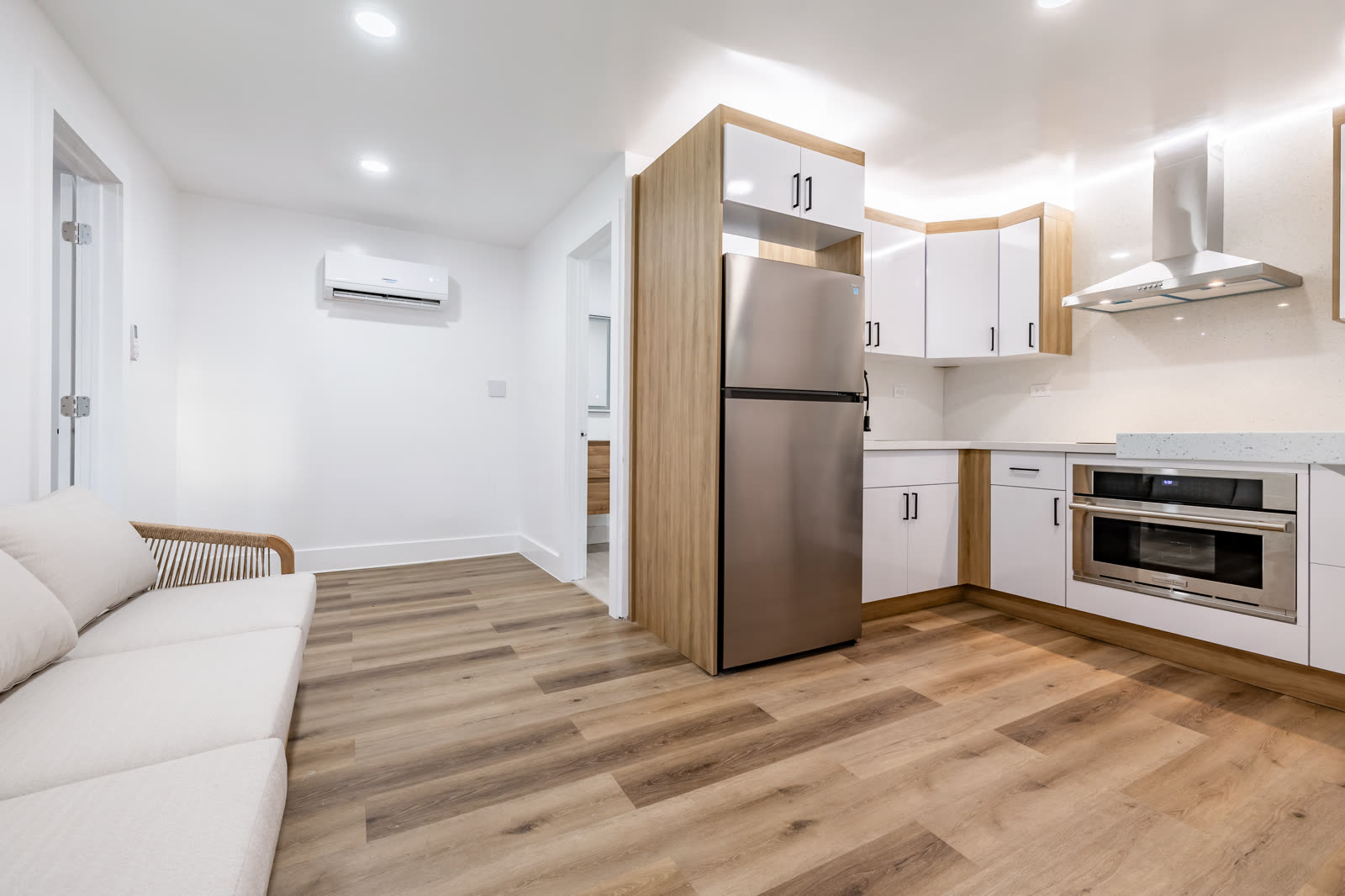Guest unit: a living area and kitchenette with ductless air conditioning